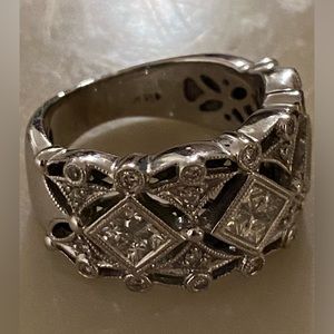 14k solid white gold and diamond statement ring.